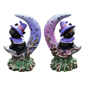 Juoda katė su raganos skrybėlės mėnulio statulos ornamentu vaiduoklių namams