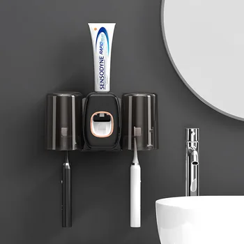 Paprastas sieninis pakabinamas automatinis darbą taupantis dantų pastos spaustuvas Dviejų puodelių dantų pastos spaustuvas su puodelio dantų šepetėlio laikiklio rinkiniu